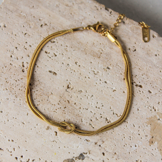 Pulsera Doble Nudo Dorada